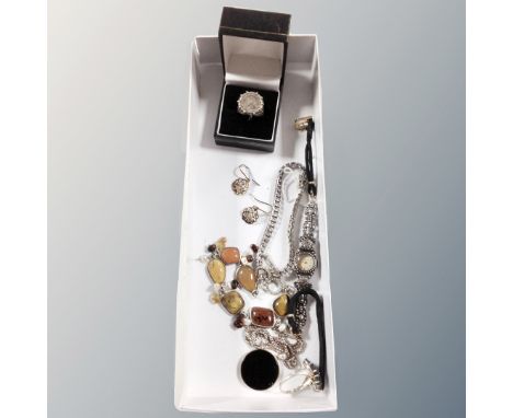 A box of costume jewellery, cocktail watch, polished stone necklace, dress rings, silver coin ring 