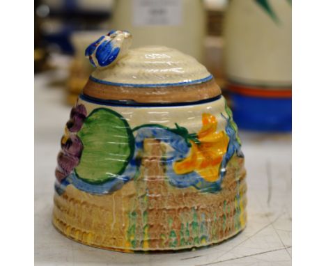 AN UNMARKED CLARICE CLIFF LIDDED PRESERVE JAR     