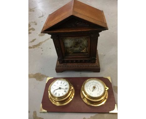 Early 20th century German oak mantel clock, together with a marine style clock barometer. (2)