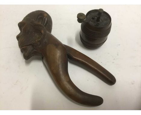 Black Forest nut cracker in the form of a monkey and a barrel form treen pepper grinderCondition report: Good condition - the