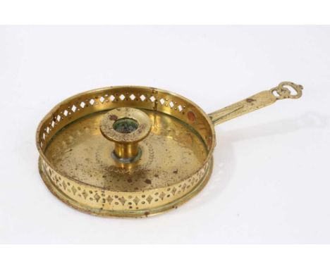 Early, possibly 17th century brass chamber stick, circular drip tray with pierced gallery and projecting handle with pierced 