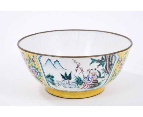 Chinese Canton enamel bowl, with figural and floral reserves on yellow ground, the interior with scene of carp, 20cm diameter