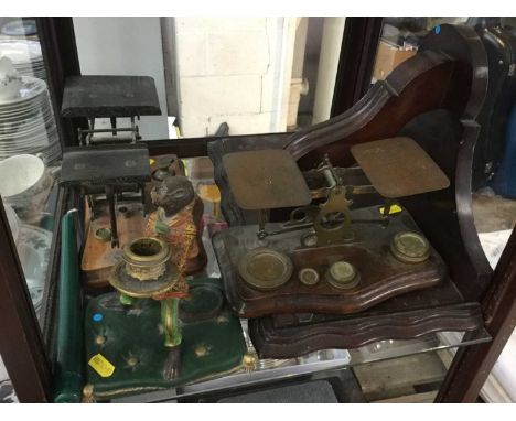 Two pairs of late Victorian brass letter scales with a collection of weights, together with a mahogany wall bracket and a can