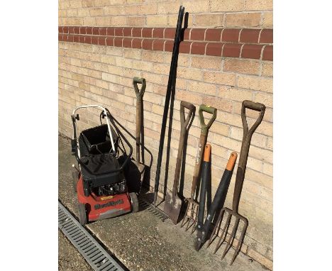 Mountfield lawn mower together with a selection of garden tools