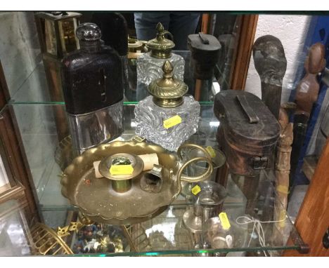 Brass mounted glass inkwell, together with brass chamber stick, silver plated leather covered hip flask and a pair of opera g