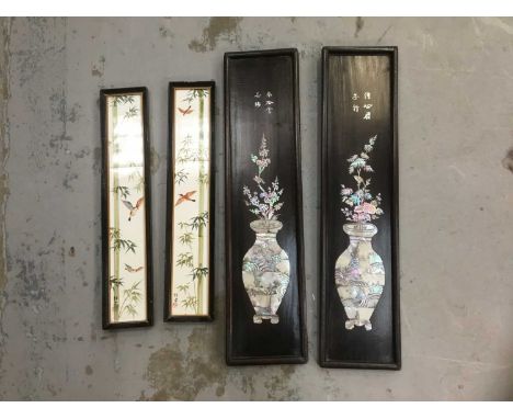Pair of Chinese hardwood and abalone inlaid panels, 61cm high, together with a pair of tile panels