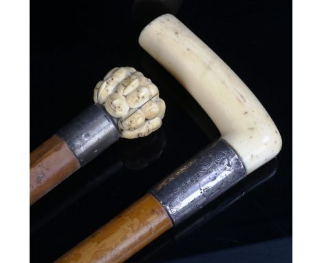 A Japanese ivory-handled netsuke, depicting man faces, and an ivory and silver-handled walking stick (2) 