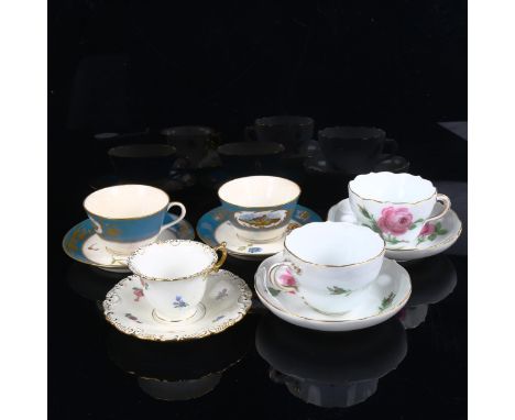 A group of cabinet cups and saucers, including pair of Meissen cups with painted roses 