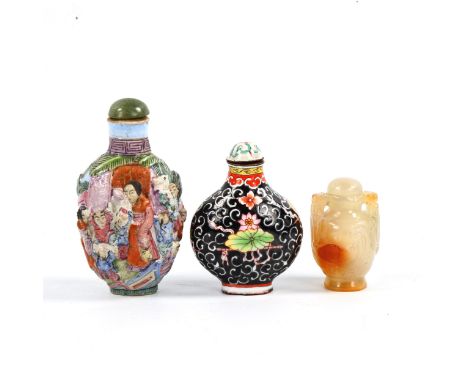 3 Chinese snuff bottles, comprising a relief carved jade bottle with stopper, height 4.5cm, a relief moulded porcelain bottle