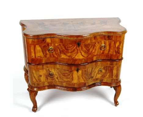 An 18th century French walnut serpentine-front 2-drawer commode, on cabriole legs, width 102cm, depth at centre 53cm, height 