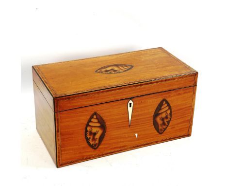 A Georgian Sheraton style satinwood tea caddy, with shell marquetry inlay and fitted inner caddies, length 30cm 