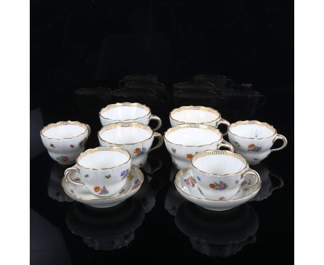 A group of Meissen porcelain cups and saucers, hand painted botanical designs 