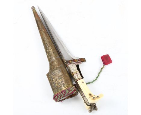 A Middle Eastern ivory-handled knife, with embossed metal scabbard, length 31cm 