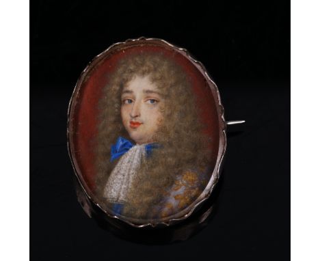 A miniature watercolour portrait a man wearing a powdered wig, in unmarked silver brooch mount, height 3cm 