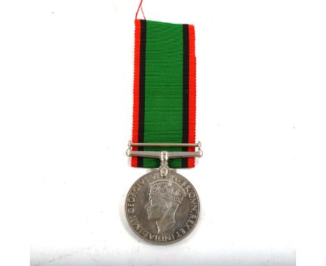 A George VI medal for service in Southern Rhodesia 1939 - 1945 