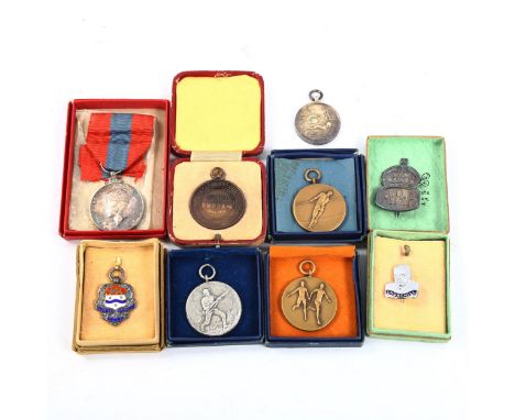 A collection of medallions, including life saving, ARP, Imperial Service medal etc 