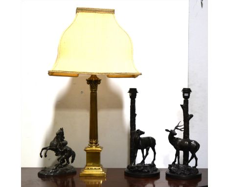 A brass Corinthian column table lamp, with shade 85cm overall; a spelter Marley horse, after Costou; and a pair of bronzed re