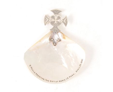 A cased christening shell in mother-of-pearl with the inscription on the shell "St Pauls Preston The Gift of Annie I E Park A