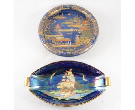 A Carlton ware blue ground chinoiserie dish gilded and painted in enamels, 26cm diameter, painted number 2519, a Crown Devon 