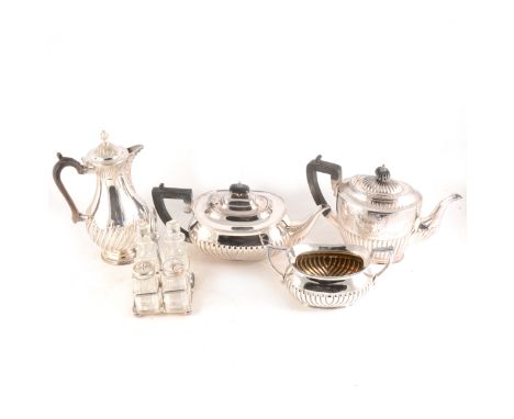 A tray of silver-plated wares, teaset, trays, cruet sets, a Stuart Crystal rose bowl, egg cups etc.