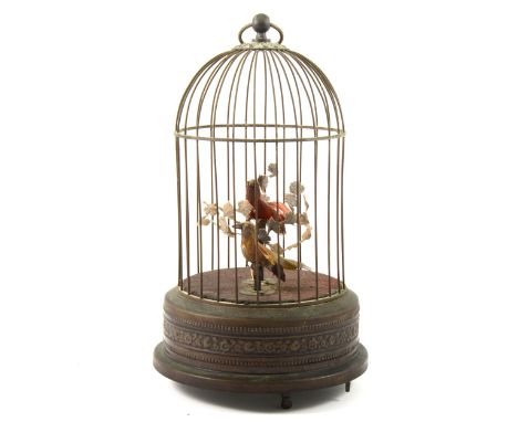 Singing bird automaton, brass cage with suspension ring enclosing two singing birds, 29cm.