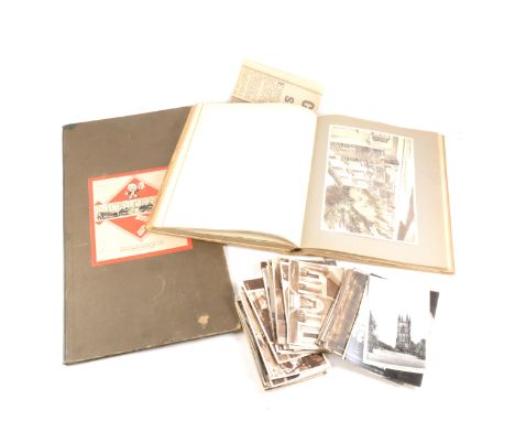 A collection of postcards in albums, topographical Great Britain and Worldwide, a Victorian photograph album with brass clasp