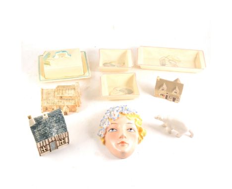 Susie Cooper entree dishes and butter dish and cover; a 1930s Art Deco wall mask (damages); a small collection of model house