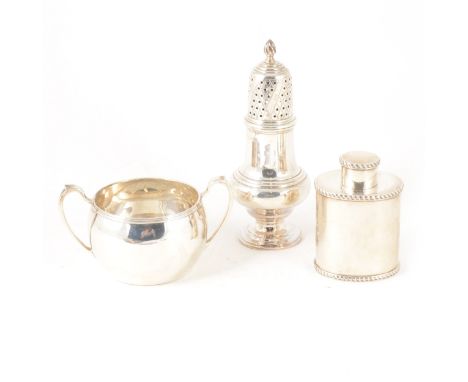 A small oval silver caddy with gadroon edge borders by Goldsmiths &amp; Silversmiths Co (William Gibson &amp; John Lawrence L