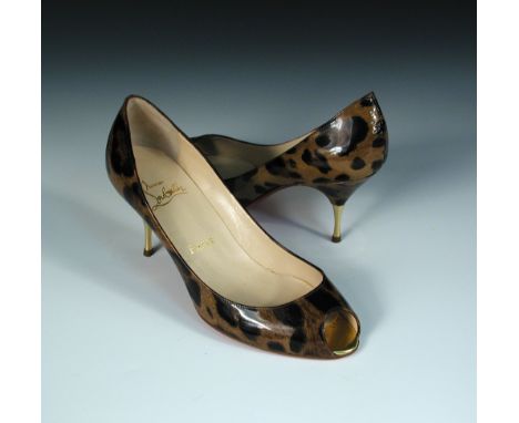 Christian Louboutin, a pair of animal print peep-toe shoes, patent, 8cm stiletto with gold tip, bagged, size 38.5  Appear new