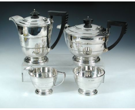 An Art Deco four-piece silver tea set, Walker and Hall, Sheffield 1938, comprising teapot of tapering banded circular form, e