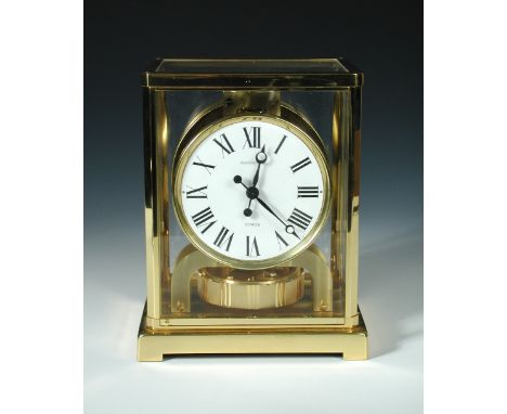 A Jaeger-LeCoultre Classic Atmos Clock circa 1972 serial number 364244, the white dial with moon hands, in a typical gilt cas