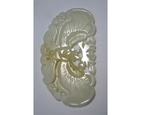 A Chinese small green jade applique or other ornament of mottled white hue, carved as a butterfly (or similar invertebrate), 