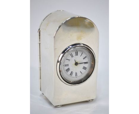 A late Victorian dome-topped silver boudoir clock with 3 cm enamel dial, on bun feet, Douglas Clock Co, Birmingham 1899, 8.5 