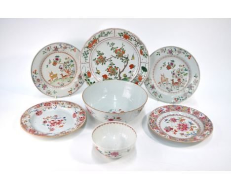 A Chinese famille rose bowl, decorated in enamels with floral designs, 23 cm diameter; a smaller bowl, similar, 14 cm diamete