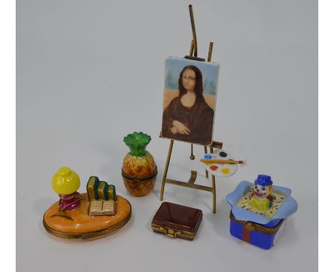 Four various Limoges china novelty patch-boxes -  Pineapple, limited edition 005/250, Jack in the Box, Desk top with oil lamp