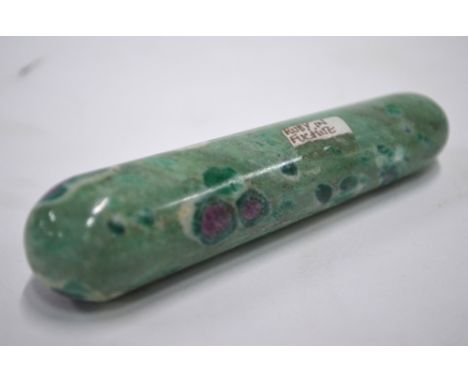 A ruby in fuchsite massage wand