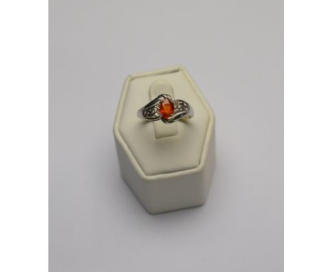 An oval fire opal and diamond ring, 18ct white gold scroll style setting to/w garnet and half cultured pearl ring in yellow m