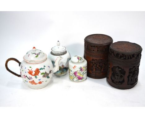 A Chinese Export teapot and cover decorated in famille rose with fish and aquatic foliage, Qianlong; together with: an ovifor