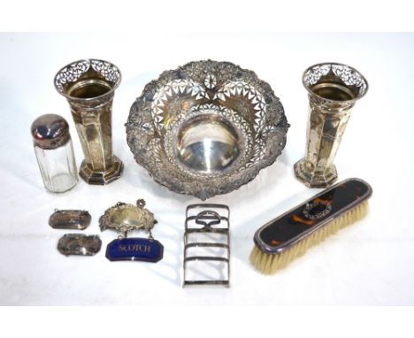 A late Victorian richly pierced silver bonbon dish, Martin, Hall & Co, Sheffield 1896, to/w a pair of small vases with pierce