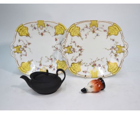 A Staffordshire stirrup cup in the form of a fox's head, 9 cm long to/w a 19th century Wedgwood black basalt oval teapot and 