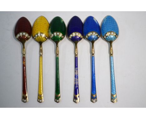 A set of six Scandinavian 925 silver gilt and harlequin enamel coffee spoons a/f Condition Report Blue and yellow enamel unda