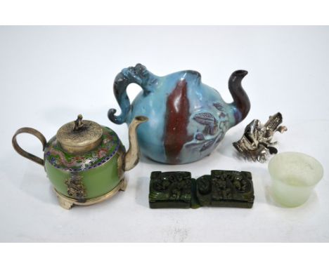 A Chinese jun-yao style teapot of cadogan form, modelled as a peach, 15 cm long; together with: a white-metal mounted teapot;