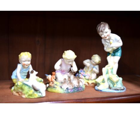 Four Royal Worcester figures modelled by F.G. Doughty - Johnnie, 3433; Woodland Dance, 3020; Mischief, 2914 and Two Babies, 3