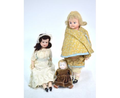 A small Armand Marseille bisque-headed girl doll (restored), to/w a composition doll with blond wig and blue glass eyes, and 