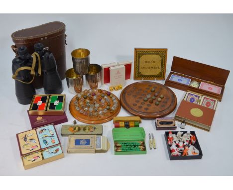 A small collection of bisque Christmas cake decorations, to/w three Continental electroplated and gilt beakers, various playi