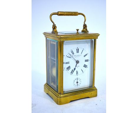 S Smith & Son Ltd, Stroud, London - A brass two train four repeat movement carriage clock with white enamelled dial and subsi