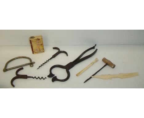 Last Exit To Brooklyn whiskey decanter in the form of a book, cork screws, tin snips etc.