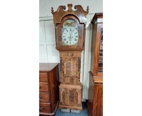 A 19th century flame mahogany crossbanded longcase clock with 12 1/2 inch painted arch top dial inscribed 'Griffith Owen, Lla