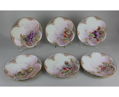 A 19th century Royal Worcester porcelain part dessert service, comprising eight plates decorated with polychrome sprays of fr
