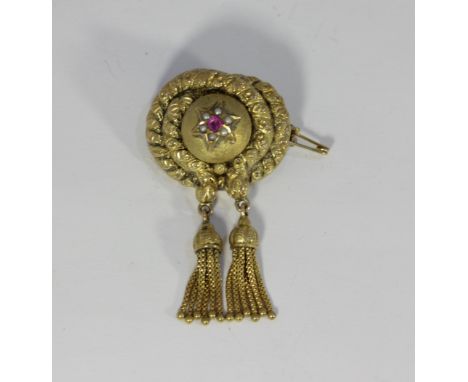 A Victorian ruby and seed pearl brooch, in Etruscan style with two drop tassels with locket compartment intact (verso), with 